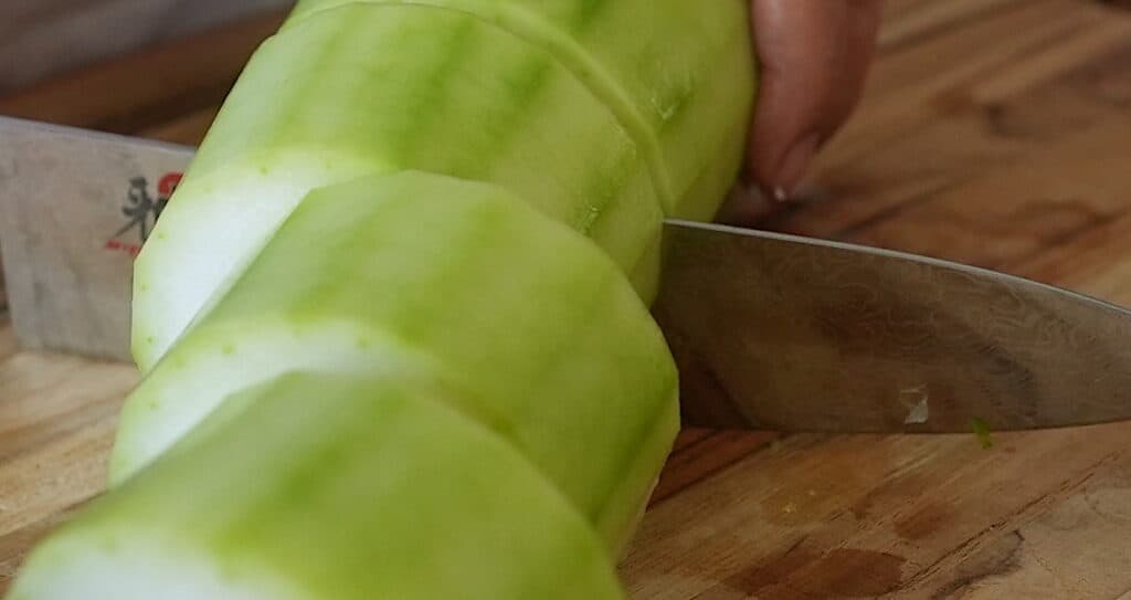 Slice Winter Melon into 1 ½ inch lengths