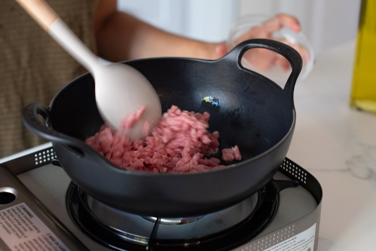 Add ground pork and cook